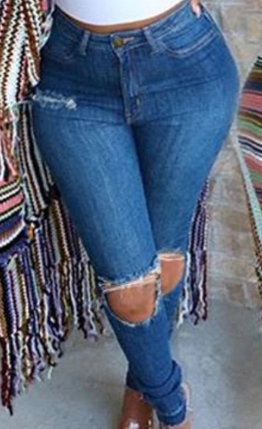 Distressed “Rip & Run” Denim Jeans